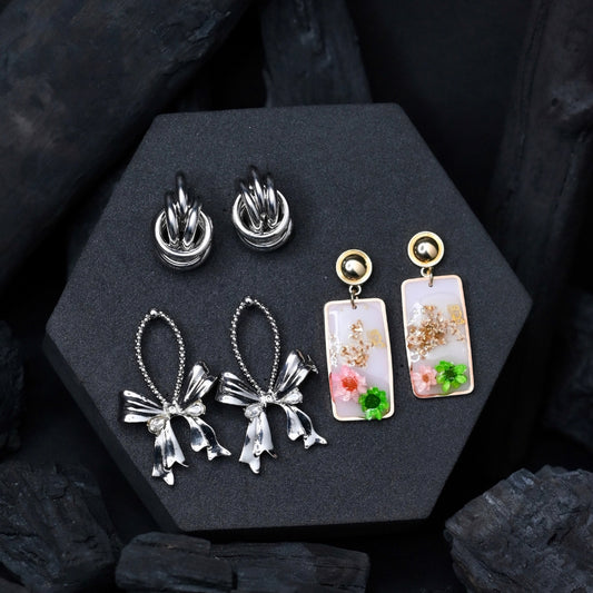 Elegant Earring Set – Silver Bow, Floral Resin, & Classic Knot Hoops